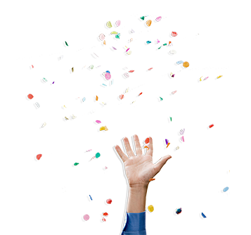 Hand reaching for confetti